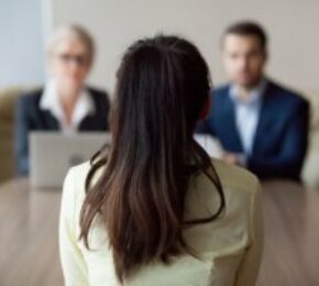 Two managers interviewing an illegal practitioner for a position